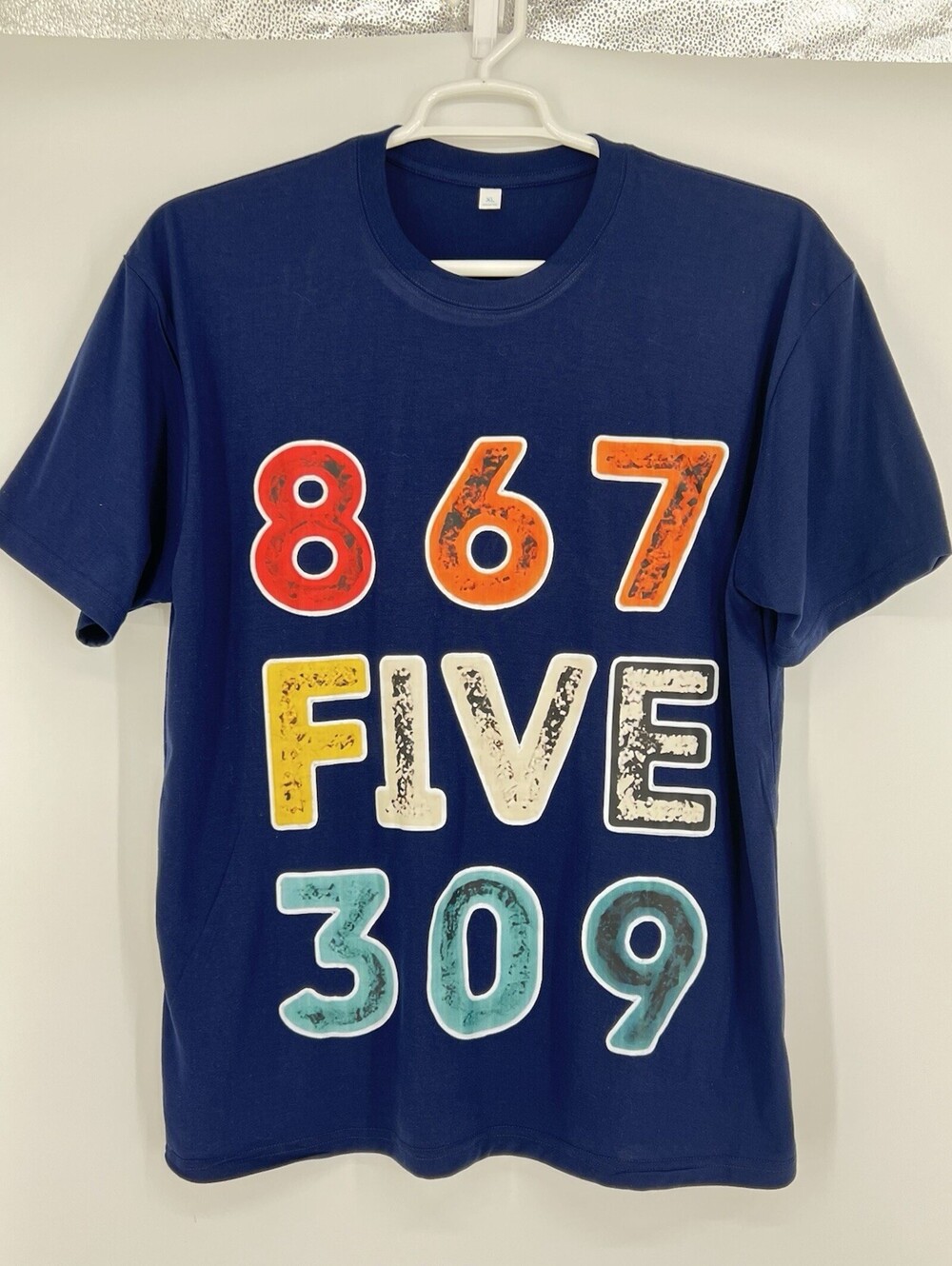 Graphics t shirt Size XL Iconic phone number